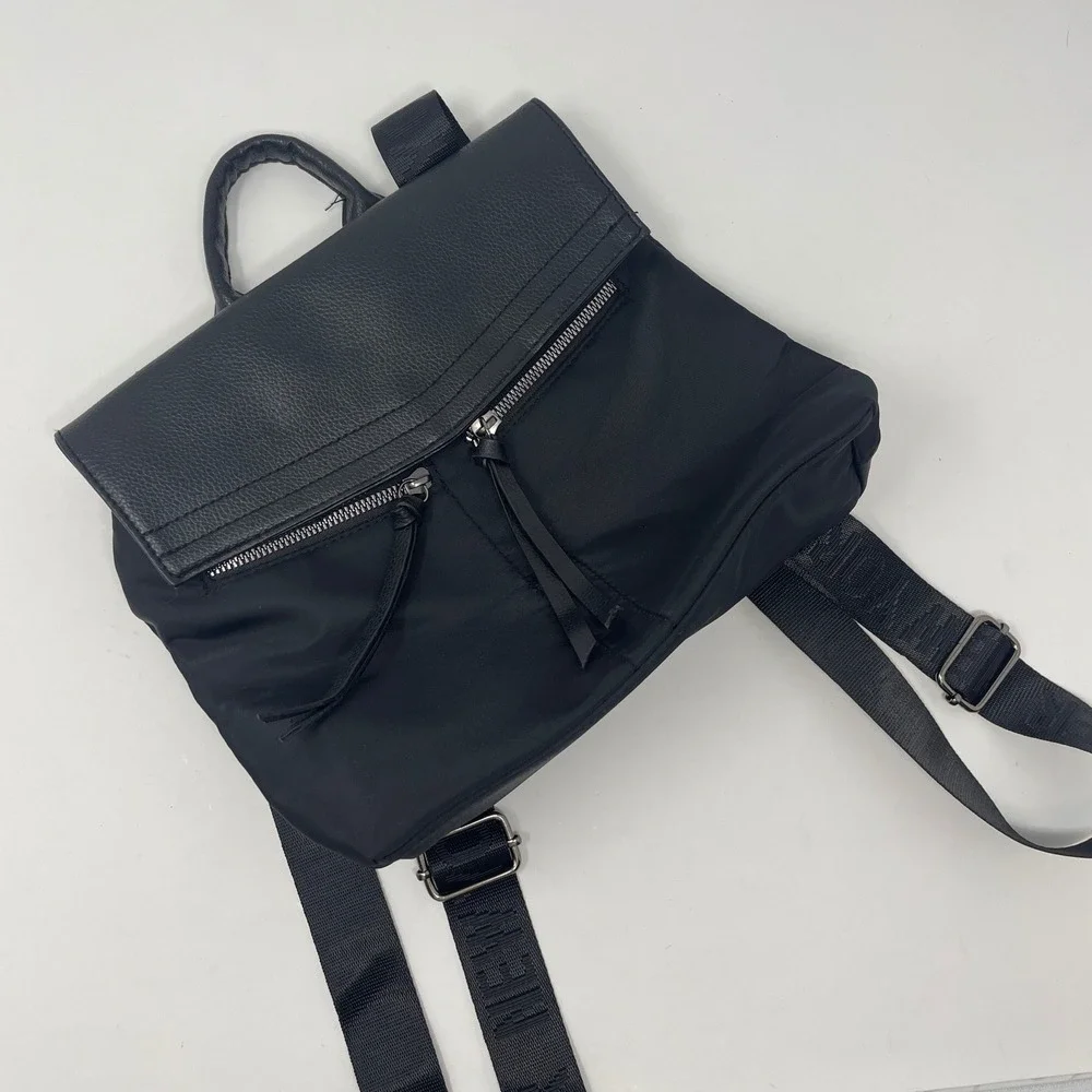 Botkier New York Black Nylon Backpack Logo Webbing Strap Tassel Zip Utility Chic